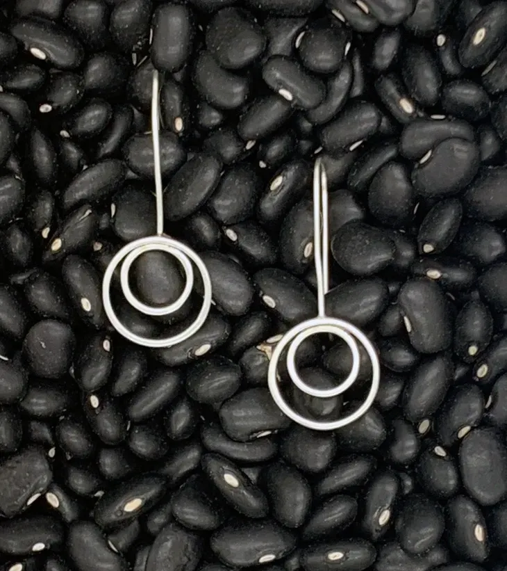 2 ring stationary centered earrings