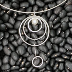 Large 3 interlocking ring pendant with top fresh water pearl and small dangling ring